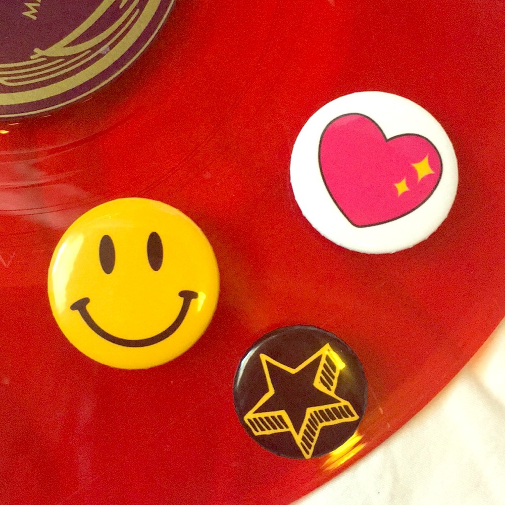 Set of three buttons